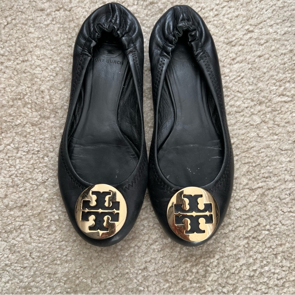 Tory Burch Reva flats with gold medallion